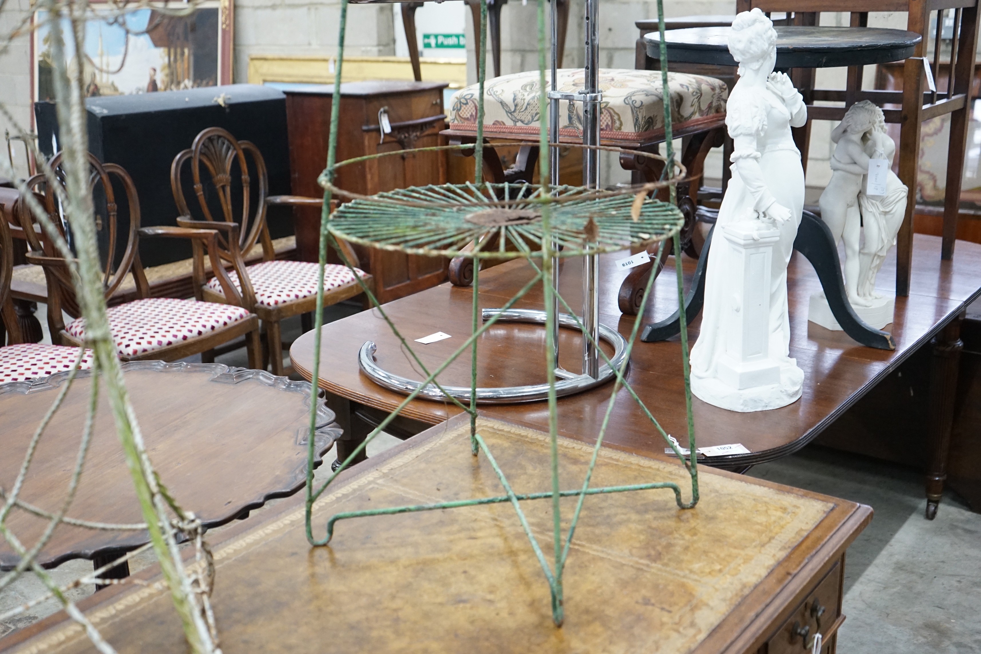 Two Victorian painted wirework pot stands, larger height 90cm